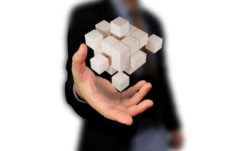 Hand holding wooden block.  risk and business strategy conceptの写真素材