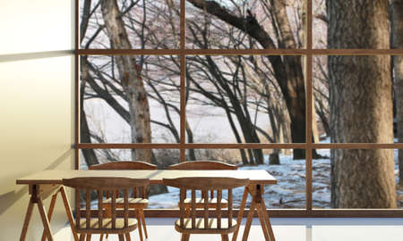 dinning room with sun ray through. wood table and wooden chairの写真素材