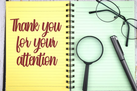 Selective focus image of magnifying glass,pen and spectacles with Thank You For Your Attention wording. Business conceptの写真素材
