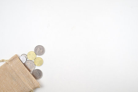 Selective focus image of coin isolated on white background with copy spaceの写真素材