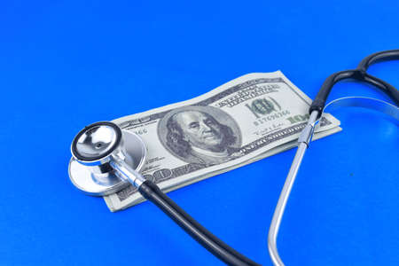 Selective focus image of stethoscope on a wooden background.Medical conceptの写真素材