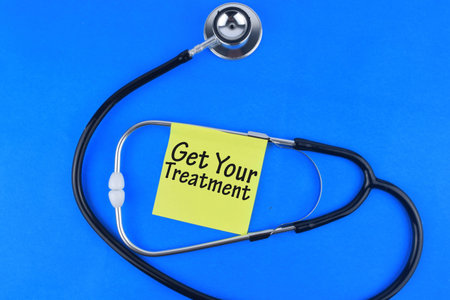 Selective focus image of stethoscope with Medical Fraud wording on a wooden background. Medical...