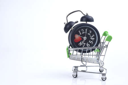 Selective focus image of trolley cart with Stop Panic Buying wording isolated in white background. Economy and buy sell conceptの写真素材