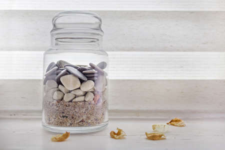 Rocks and sand in a jarの写真素材