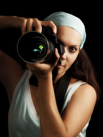 profefessional photographer working in studioの写真素材