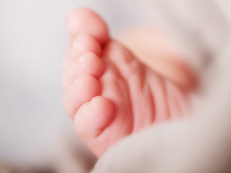 newborn one little foot