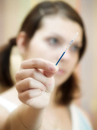 young woman making pregnancy testの写真素材