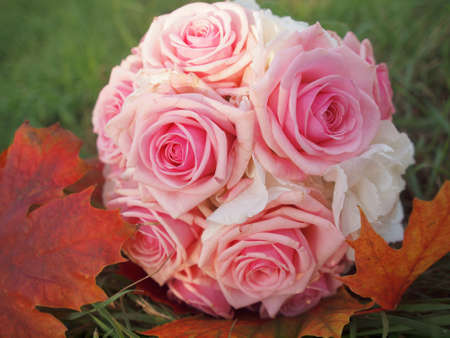still life with wedding bouquet and wedding ringsの写真素材