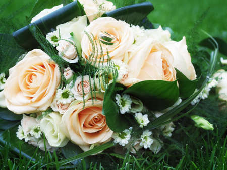 still life with wedding bouquet and wedding ringsの写真素材