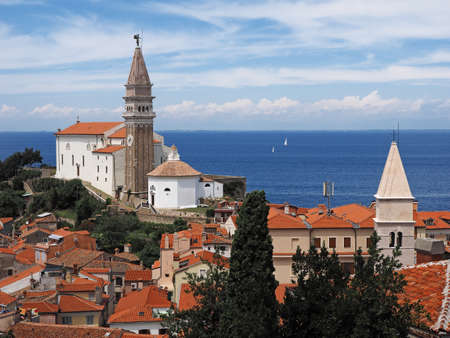 View of town Piran in Slovenian Istria on the Adriatic coast with churchの写真素材