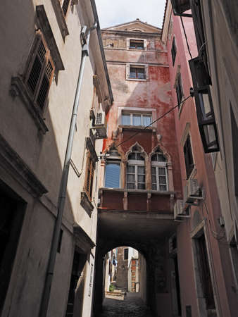 narrow streets in the historic center town Piran in Slovenian Istria on the Adriatic coastの写真素材