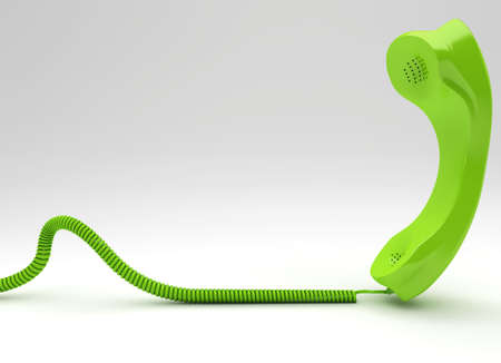 Green wired telephone isolated on white backgroundの写真素材