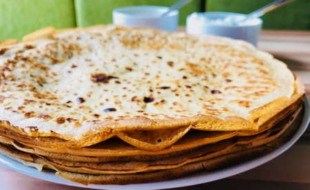 food pancakes morning breakfast closeup with some jam and cheese on the backgroundの写真素材