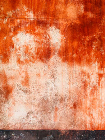 colorfull vibrant outdoor bumpy dark brown with orange vintage wall textureの写真素材