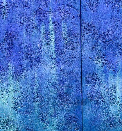 colorfull vibrant outdoor bumpy deep blue color perspective vintage wall textureの写真素材