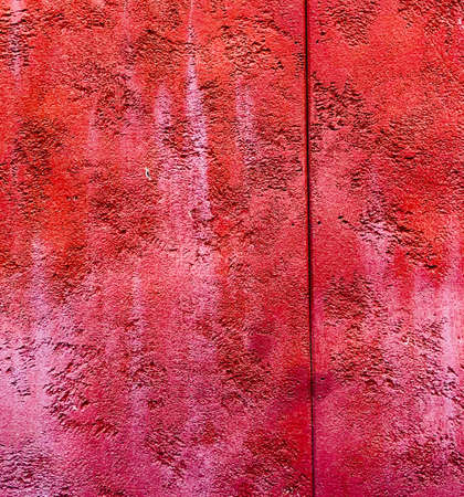 colorfull vibrant outdoor bumpy brick red color perspective vintage wall textureの写真素材