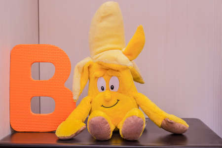letter alphabet b near banana puppetの写真素材
