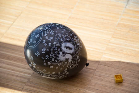 close up black balloon on the floor