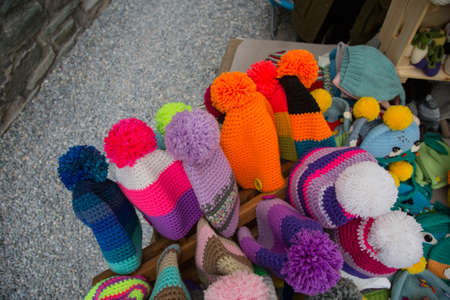 close up of pompoms and colorful hatsの写真素材