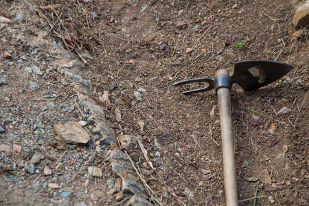 close-up of hoe to cultivate the land