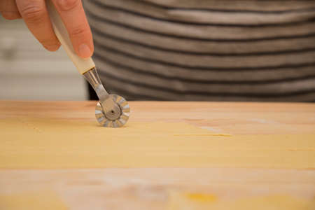 close-up of utensil to cut pastaの写真素材