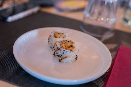 closeup of chinese cuisine with sushi in dishの写真素材