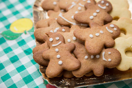horizontal image with detail of a tray with nice Christmas cookiesの写真素材