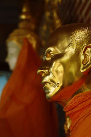 Buddhist statue in a opened room at a temple in Northern Thailand, Southeast Asiaの写真素材