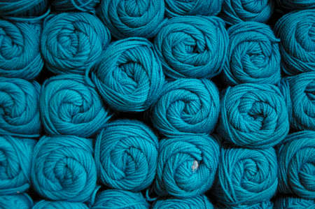rolls of brightly colored wool yarn made from Merino wool, Australia