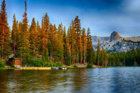 Lake Mamie Boat House near Mammoth Lakes at sunrise in the California Eastern Sierra Mountians の写真素材
