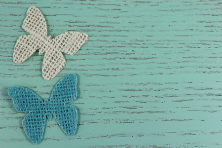 butterflies on a rustic wod backgroundの写真素材