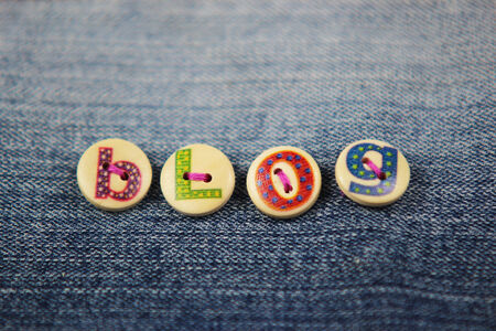 the word blog plelled in lettered buttonsの写真素材