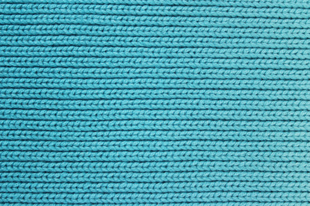 turquoise knitted wool backgroundの写真素材