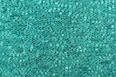 turquoise knitted textile backgroundの写真素材