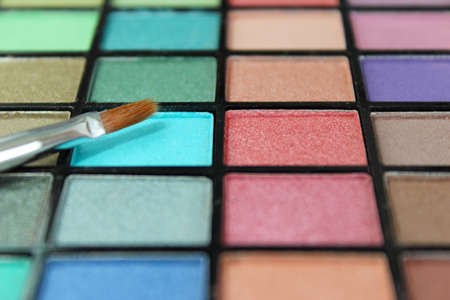 Eyeshadow make up palette with focus on make up brushの写真素材