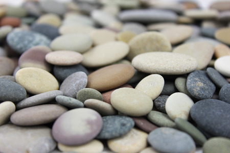 Colored Beach stones or pebbles close up macro shot.の写真素材