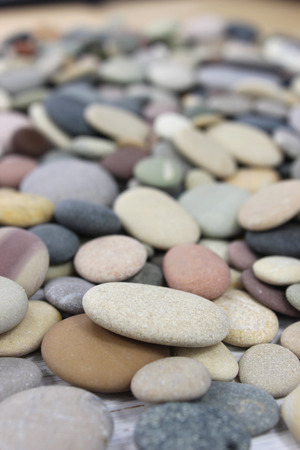Colorful pebbles on a beach. Portrait.の写真素材
