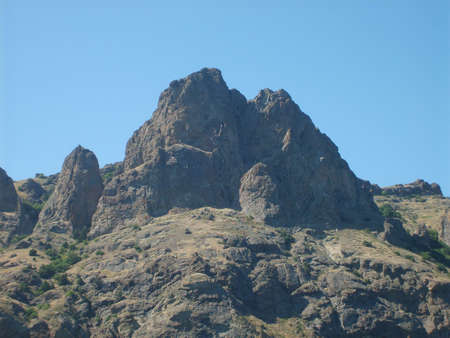 Beautiful kind of mountain top against the blue pure skyの写真素材