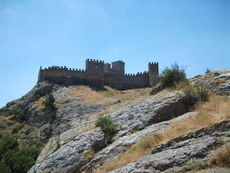 Ancient Genoa fortress in Crimea at top of a mountain ridgeの写真素材