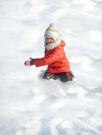 Small girl game of snowの写真素材