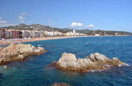 People on the beach at Lloret de Mar (Costa Brava, Catalonia, Spain)