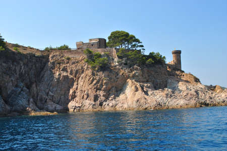 the old-time fortress in spanish city Tossa.の写真素材