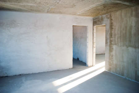 empty concrete gray wall of the apartment before renovationの写真素材