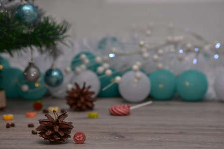 attributes of winter and new year on a wooden surface