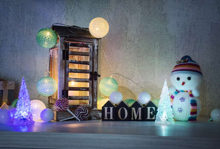 Christmas decorations for home, candles, garlands, toys, snowmanの写真素材