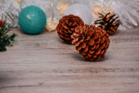 cedar cone close-up on a wooden surfaceの写真素材