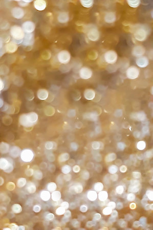 golden bokeh texture background with glowing highlights