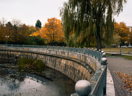 old embankment in autumn, stone fence. autumn moodの写真素材