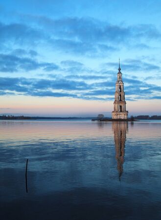 Famous and Beautiful Flooded Belltower on the River Volga at sunset. Kalyazin, Russiaの写真素材