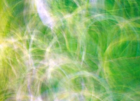 Photo art, bright Colorful light streaks abstract background in yellow and green colorsの写真素材